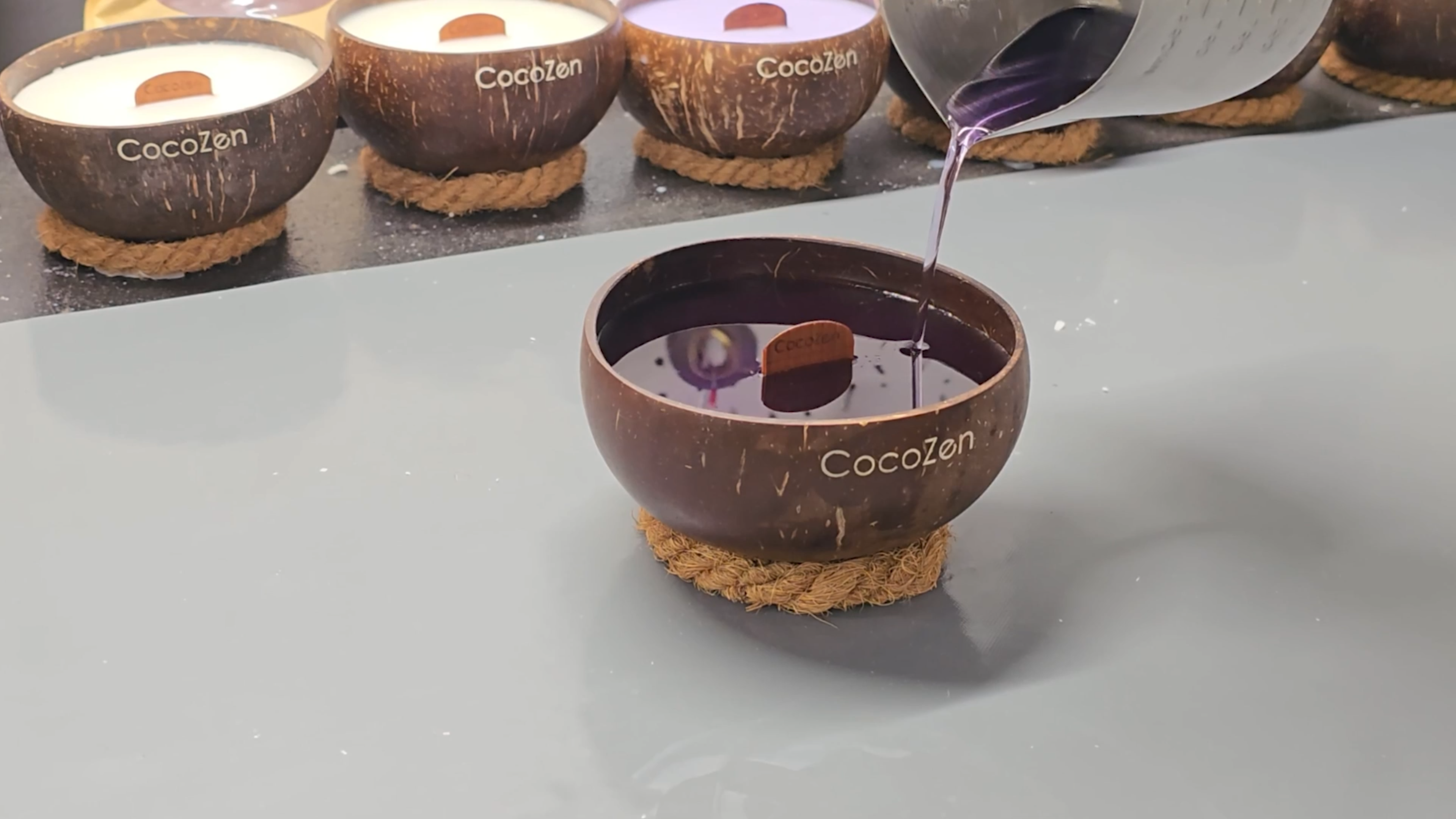 CocoZen coconut-shell candles being poured