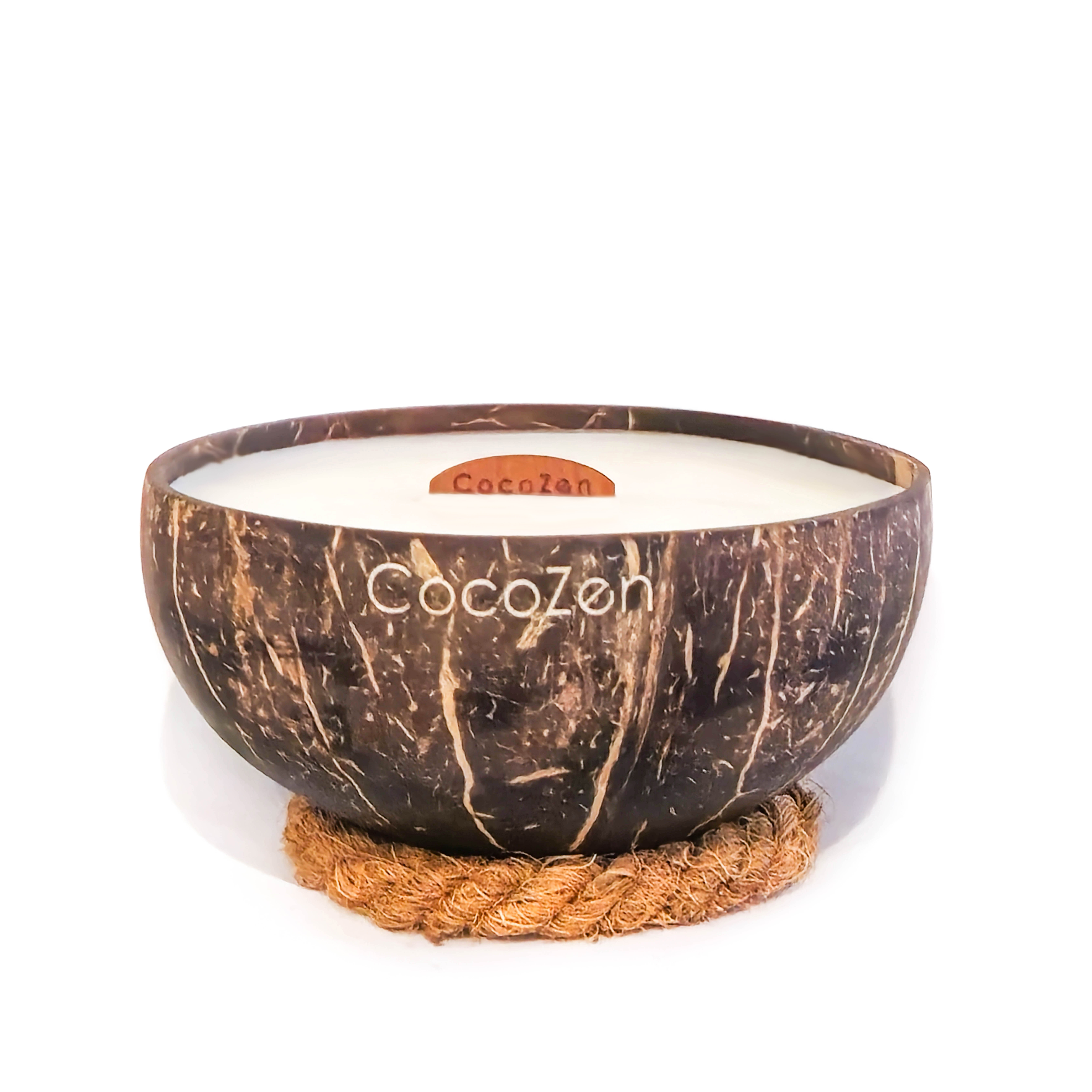 A CocoZen coconut shell repurposed as a planter